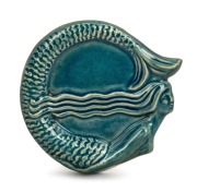 ARTIST&nbsp;UNKNOWN blue glazed pottery mermaid dish, incised with artist's monogram (illegible) and appears to be dated "'35", 13cm wide