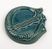 ARTIST&nbsp;UNKNOWN blue glazed pottery mermaid dish, incised with artist's monogram (illegible) and appears to be dated "'35", 13cm wide - 2