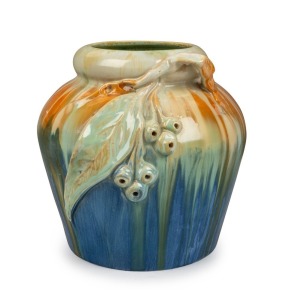 REMUED blue glazed pottery vase with applied gumnuts, leaf and branch handle, interior glazed in green, incised "Remued 42LM", 19.5cm high