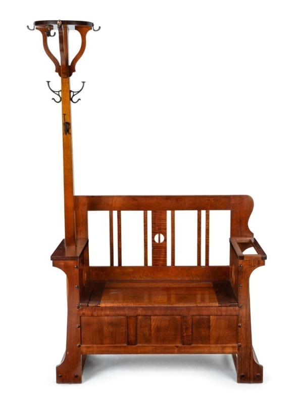 ROJO (attributed) of Melbourne, Australian Arts and Crafts solid blackwood hall seat with a hat tree, flip-top trunk and fiddleback slats, circa 1920, 192cm high, 113cm wide, 43cm deep