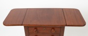 An antique Australian cedar book press worktable with drop-sides, two drawers and shaped block legs, 19th century, 74cm high, 50cm wide (91cm extended), 39cm deep - 2