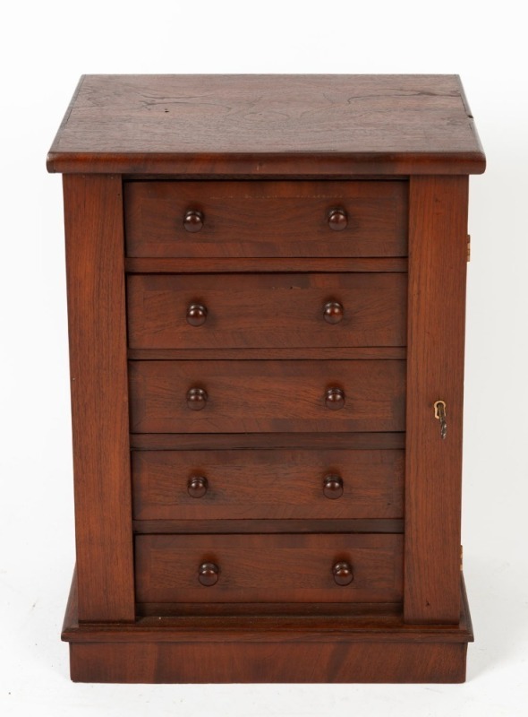 An Australian cedar miniature Wellington chest of five drawers, 20th century, 53cm high, 38cm wide, 26cm deep