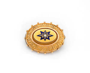 BROOCH: Victorian gold seed pearl and blue enamel mourning brooch.
