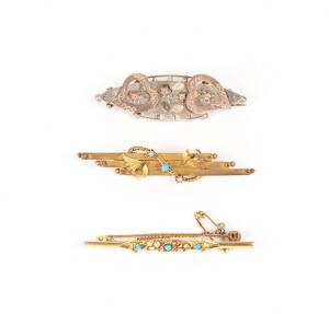 BROOCHES: Three Victorian gold and silver bar brooches set with turquoise and seed pearls.&nbsp;