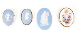 BROOCHES: Royal Worcester floral porcelain brooch; two Wedgwood jasper ware porcelain brooches and a Wedgwood jasper ware oval plaque.