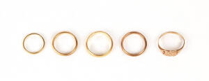 RINGS: Five gold rings, various carats. Total weight 14.5 grams.
