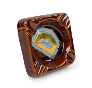 JOHN CAMPBELL rare WWII pottery ashtray, adorned with the colour patch of the 2/9th Australian Armoured Regiment, circa 1942, incised "John Campbell, Tasmania", 11cm wide