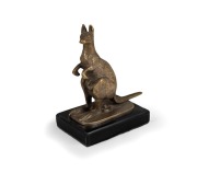 A cast bronze kangaroo statue on black glass base, possibly a car mascot, circa 1920/30s, 12cm high