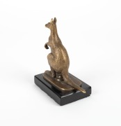 A cast bronze kangaroo statue on black glass base, possibly a car mascot, circa 1920/30s, 12cm high - 3