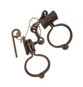 LEG IRONS with puzzle lock and key, 19th century, ​​​​​​​40cm wide