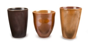 GWYN HANSSEN PIGOTT group of three ceramic beakers, the largest 12.5cm high