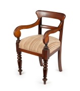 A Colonial Australian spade back cedar library chair, New South Wales origin, circa 1850, ​​​​​​​52cm across the arms