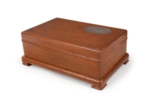 A TIMBER BOX ON INTEGRAL STAND PRESENTED TO LT. GENERAL SIR JOHN MONASH, 1924 A superbly crafted timber box, the removable top with inlaid silver plaque depicting Japanese War Cruiser H.I.J.M.S. "IBUKI" on top; the inside with another inlaid plaque with 