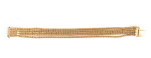 BRACELET: 18ct gold five strand flat link bracelet. 35 grams
