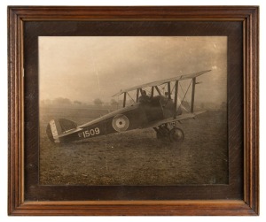 A.F.C. (AUSTRALIAN FLYING CORP) Sopwith Camel, series E1059, black and white albumen photograph of a WW1 aeroplane, housed in original oak frame, ​​​​​​​29 x 36cm, 40 x 48cm overall