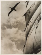 THE B.A.N.Z. ANTARCTIC EXPEDITION:Official original photograph by Captain Frank Hurley:Image A23 - Title: With The Discovery in the Antarctic, January, 1930,with official "MAWSON ANTARCTIC EXPEDITION" handstamp and release date "TUESDAY MAR. 25, 1930" ver