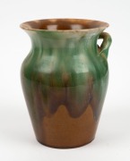 REMUED green and brown glazed pottery vase with applied gumnuts and leaves, incised "Remued, Hand Made", 19cm high - 2