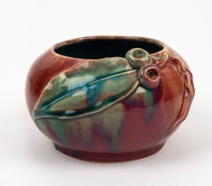 REMUED pottery vase with applied gumnuts and leaf, glazed in vibrant pink and green with blue interior, incised "Remued, Hand Made", 11cm high, 17cm wide