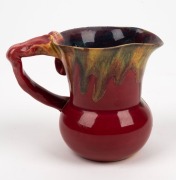 REMUED pottery jug with branch handle, gumnuts and leaf, glazed in a rich pink and green with yellow highlights, incised "Remued", ​​​​​​​11cm high - 2