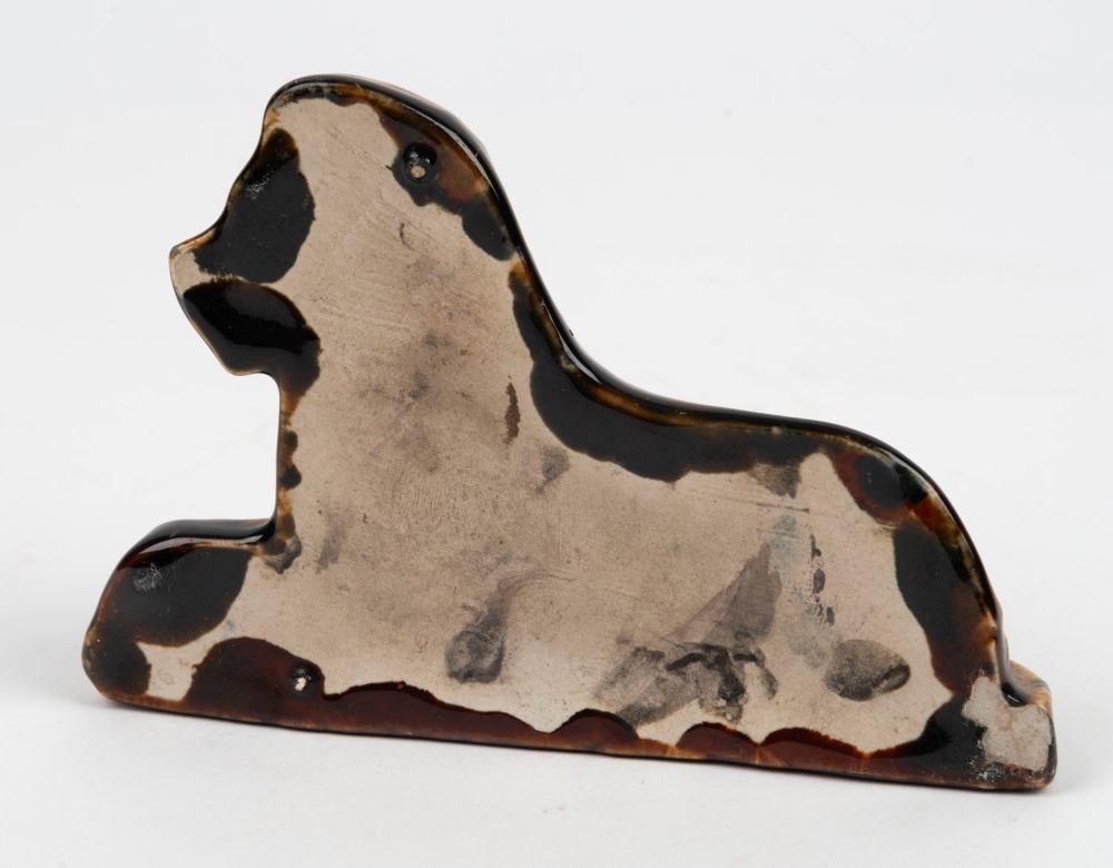 BENDIGO pottery lion bookend, 19th century, 9cm high, 13.5cm wide