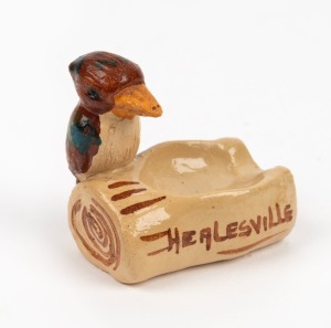 MERRIC BOYD (attributed) "Souvenir of Healesville" pottery kookaburra cigarette holder, incised "Hand Made", 6cm high, 6cm wide