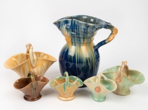 REMUED blue glazed pottery jug with branch handle, together with five assorted basket vases, the jug 25cm high