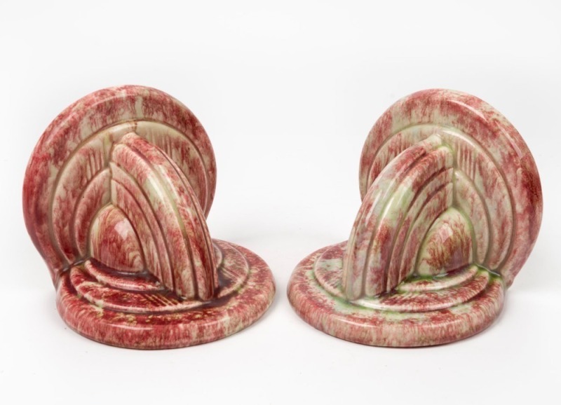 PATES Australian Art Deco ceramic bookends, mottled maroon with green highlights, 13cm high