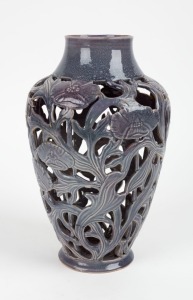 KLYTIE PATE pierced pottery vase with floral motif in mauve glaze,incised "Klytie Pate",28.5cm high