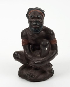 DARBYSHIRE Australian ceramic statue of a squatting Aboriginal man, mid 20th century, 13cm high