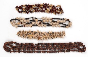 Four assorted Australian shell bead and seed pod necklaces, the largest 120cm long