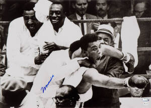 MUHAMMAD ALI, signed photograph from the Muhammad Ali vs Sonny Liston fight, February 25th 1964, size 51x36cm. With 'Online Authentics' No.OA-0000181.
