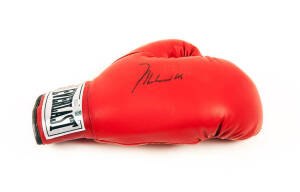 MUHAMMAD ALI, signature on 'Everlast' boxing glove. With 'Online Authentics' No.OA-7847278.