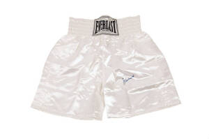 MUHAMMAD ALI, signature on pair of 'Everlast' boxing shorts. With 'Online Authentics' No. OA-8090216.