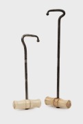 Two antique whalebone and steel boot hooks, 19th century, 28cm and 21cm high