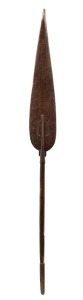 A tribal paddle, carved wood, Trobriand Islands, 153cm long