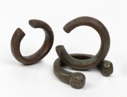 Three metal money slave rings, unknown age and origin, the largest 8cm high