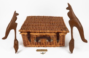 Two folk art kangaroo ornaments, carved wood with original brown painted finish; together with a vintage picnic basket, hair comb and koala souvenir brooch, 19th/20th century, (5 items), the kangaroos 34cm and 31cm high