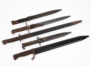 Five assorted bayonets and scabbards, including English and German examples, ​​​​​​​the largest 58cm long