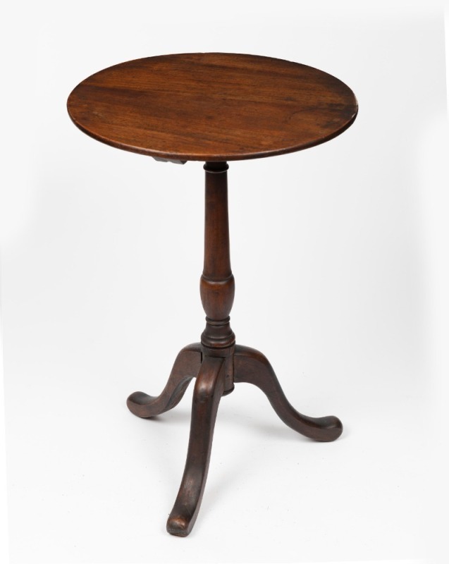 An antique Australian cedar provincial wine table with two piece solid top on vase turned column supported by three cabriole legs, circa 1890, 64cm high, 43cm diameter