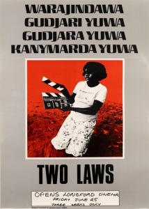 "WARAJINDAWA/TWO LAWS", c. 1981 poster designed and printed by Panacea Press for feature film about the Borroloola people's struggle for the recognition of Aboriginal law. Offset print, laminated, 56.5 x 40.5cm