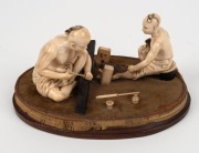 An antique Chinese carved ivory figural group of two seated craftsman, Qing Dynasty, early to mid 19th century, ​​​​​​​10cm high, 20cm wide - 6