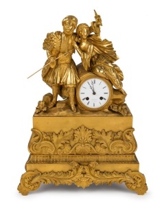 A fine antique French mantle clock in figural ormolu case with eight day time and bell striking movement with silk suspension, one piece enamel dial with Roman numerals, signed "STAUFFERT A PARIS", 19th century, 50cm high