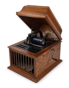 EDISON "AMEROLA" (serial No.#30 SM-111552) American oak cased cylinder player with origin Auckland New Zealand retailer's decal "WADE & CO. Ltd.", early 20th century, 33cm high, 32cm wide, 40cm deep