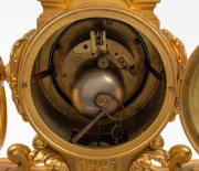An impressive antique French three piece gilt metal clock set with candelabra garnitures, eight day time and strike movement and Roman numerals, 19th century, manufactured by LEMERLE CHARPENTIER, the clock 61cm high - 2