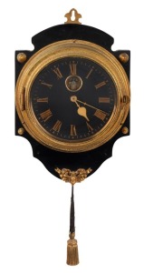 An antique French wall clock with tassel wind movement, exposed lever escapement, black dial and Roman numerals, 19th century, 35cm high overall
