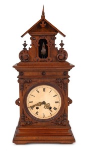 An antique German "ROOSTER" clock in walnut case with pierced fretwork sides, 19th century, back plate stamped "I.B.", note: no rear door, 56cm high