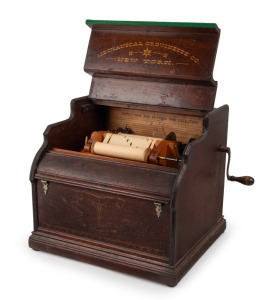 MECHANICAL ORGUINETTE Co. of New York, hand-cranked organ player, circa 1910, 36cm high, 40cm wide, 35cm deep