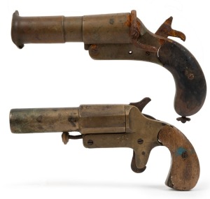 Two WW1-period flare guns, one by Webley & Scott, the larger 25cm long