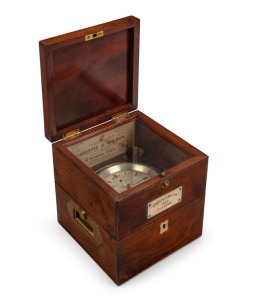 An antique Scottish marine chronometer with 56 hour up and down subsidiary dial and seconds dial, plus spring detent escapement movement, in original mahogany case with brass gimble and fittings, dial marked "CHRISTIE & WILSON, 132 BROOMIELAW, GLASGOW, No.630", 19th century. With later travel case. dial 9.2cm diameter, the original case 19cm high, 18cm wide, 18cm deep