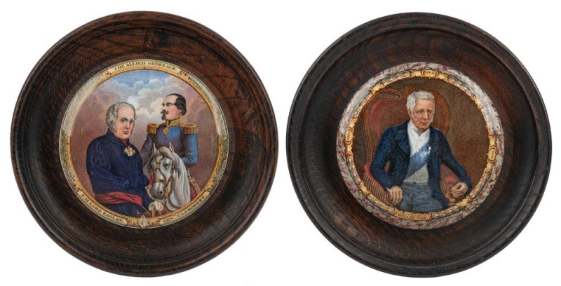 PRATT WARE two antique English pot lids in dark timber frames, titled "The Late Duke Of Wellington", and "The Allied Generals, F.M. Lord Raglan, Gen.rl Canrobert", 19th century, 12cm diameter